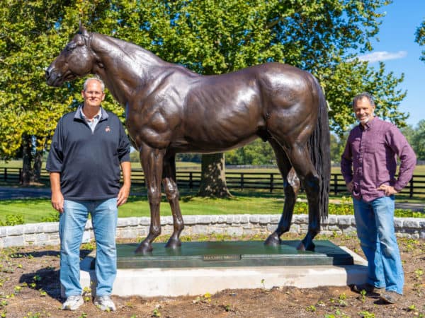 Spendthrift general manager Ned Toffey and Malibu Moon statue sculptor Douwe Blumberg