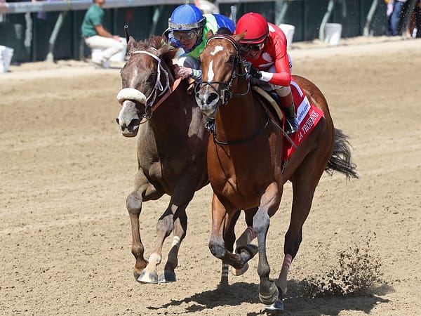 Played Hard (at right) holds off Secret Oath in the G1 La Troienne S. at Churchill Downs - Coady photography